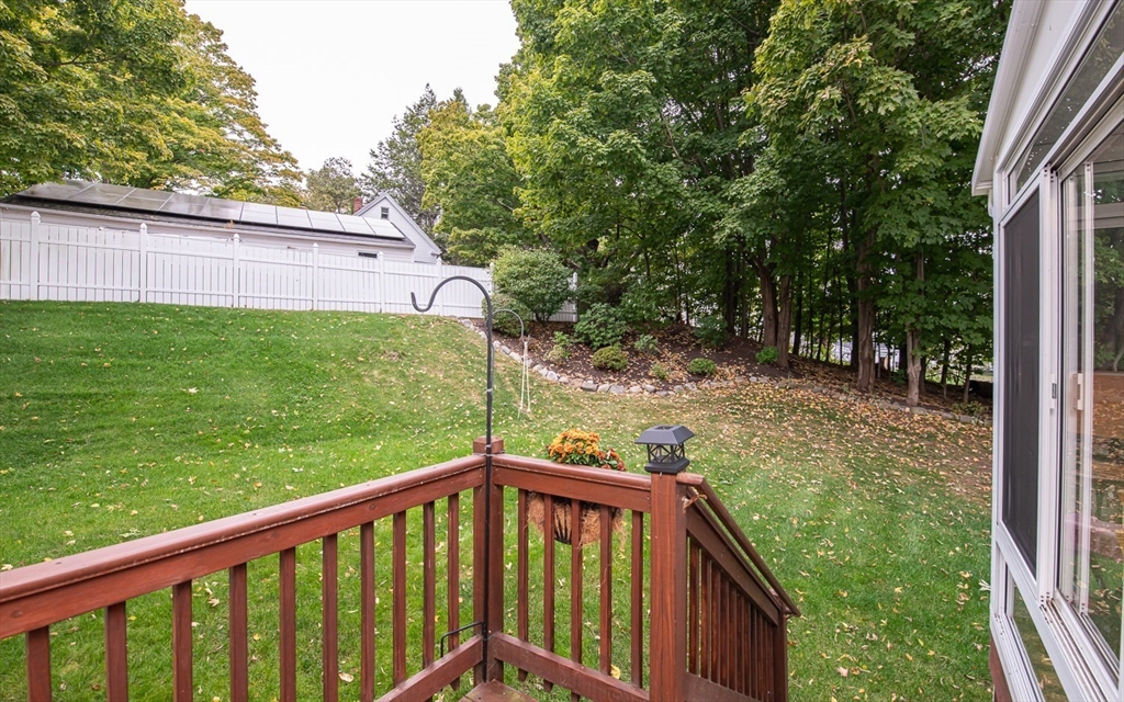 6 Innisfree Drive Haverhill, MA 01832 - Photo 37 of 41 a view of a backyard with plants and large trees