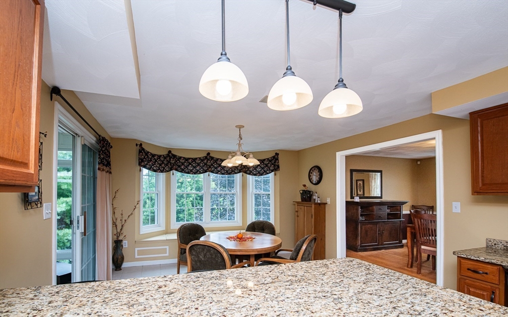 6 Innisfree Drive Haverhill, MA 01832 - Photo 6 of 41 a view of a dining room with furniture window and wooden floor