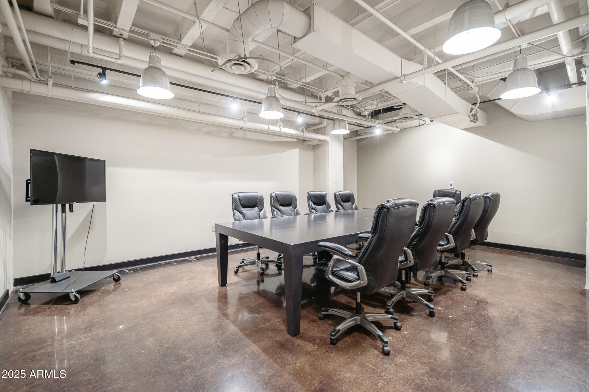 114 West Adams Street, Unit 402 Phoenix, AZ 85003 - Photo 15 of 25 a view of a room with gym equipment