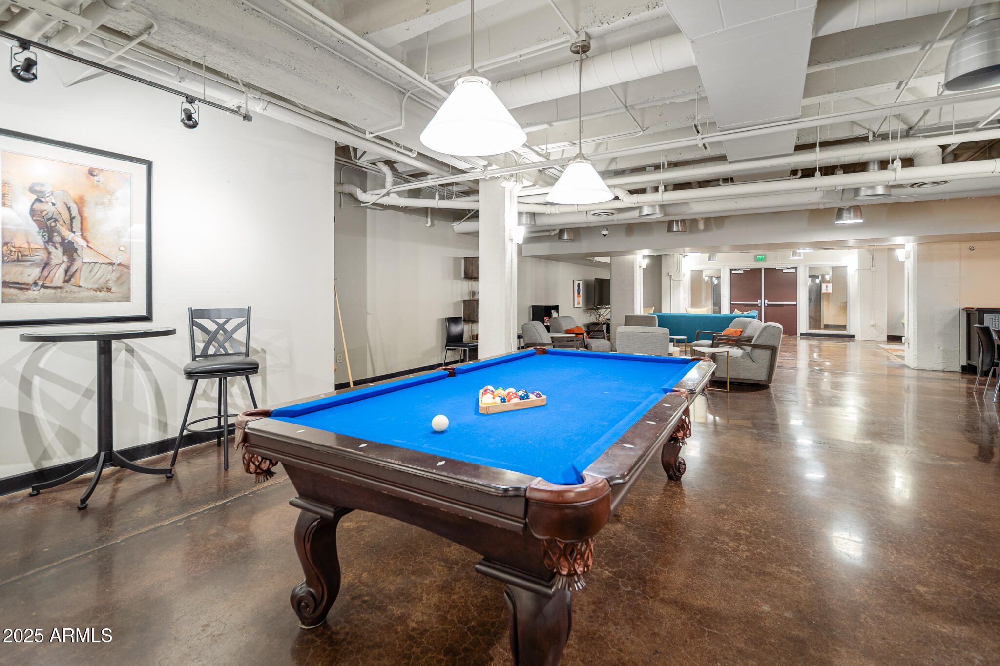 114 West Adams Street, Unit 402 Phoenix, AZ 85003 - Photo 8 of 25 a room with pool table and windows