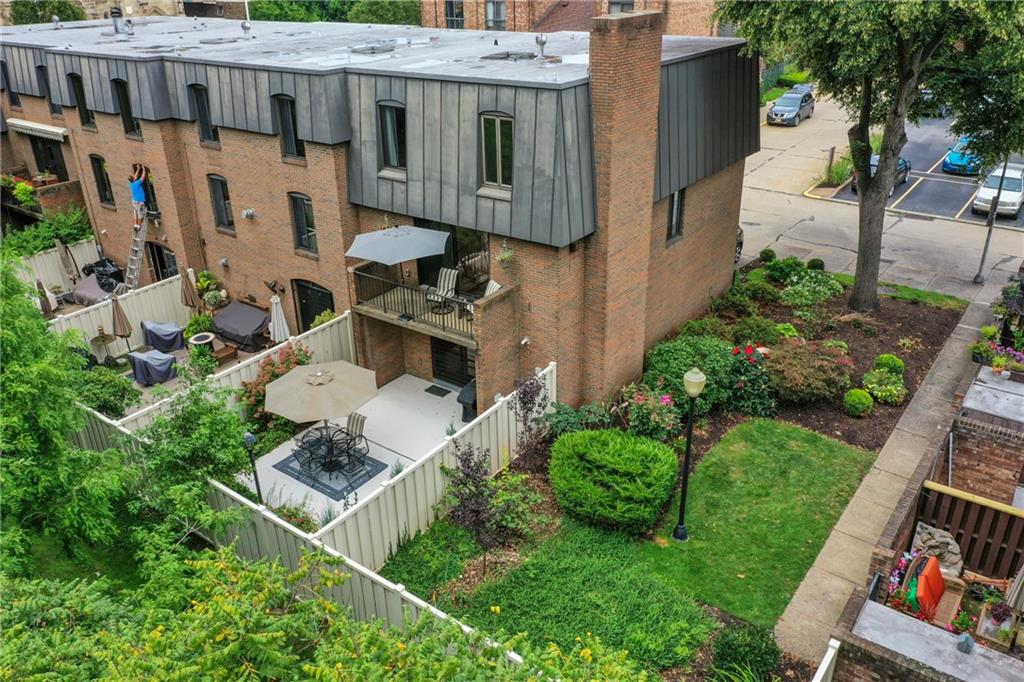 5 Foster Square Pittsburgh, PA 15212 - Photo 2 of 25 a aerial view of a house with table and chairs in a yard