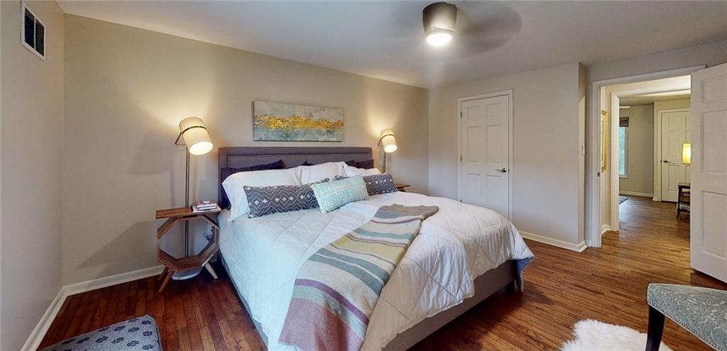 5 Foster Square Pittsburgh, PA 15212 - Photo 11 of 25 a bedroom with bed and a night stand