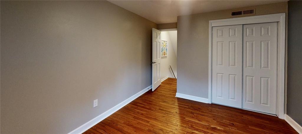 5 Foster Square Pittsburgh, PA 15212 - Photo 14 of 25 a view of a hallway with wooden floor