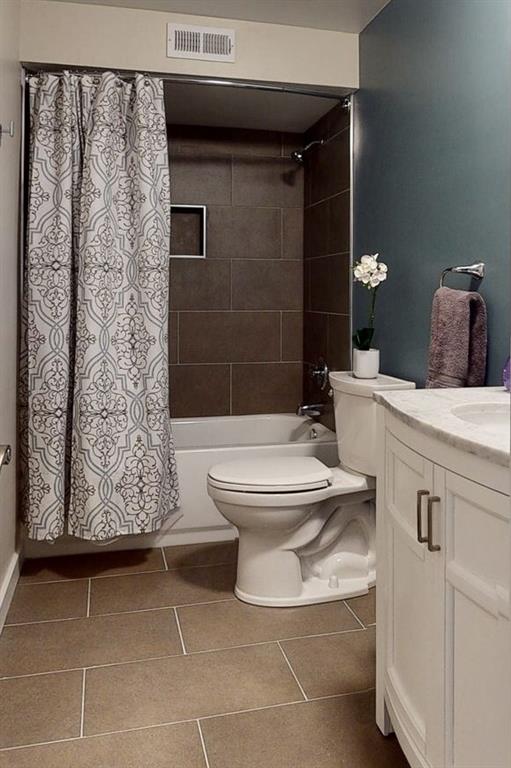 5 Foster Square Pittsburgh, PA 15212 - Photo 17 of 25 a bathroom with a toilet and shower