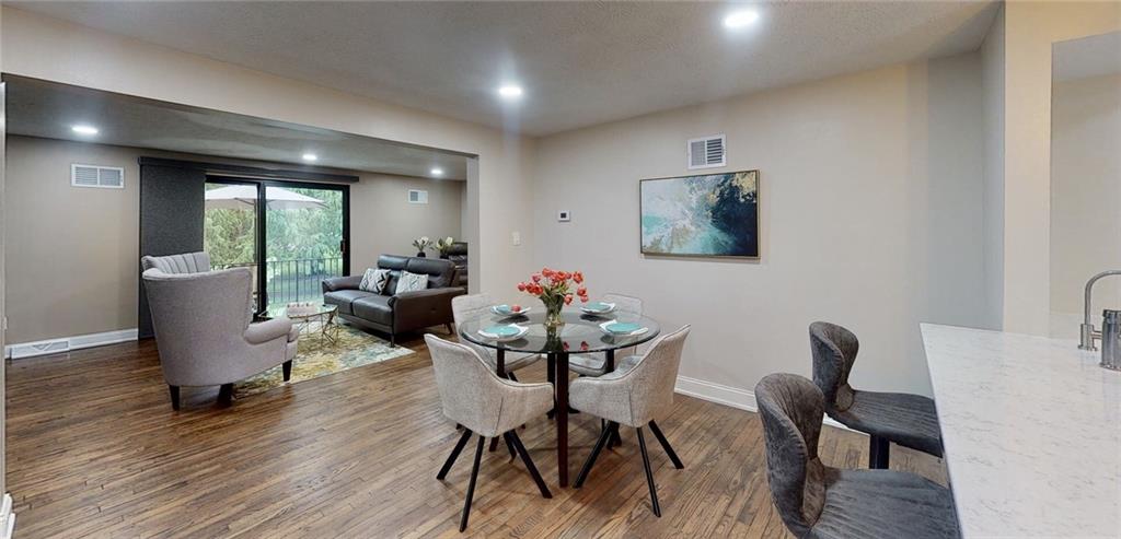 5 Foster Square Pittsburgh, PA 15212 - Photo 8 of 25 a dining room with furniture and wooden floor