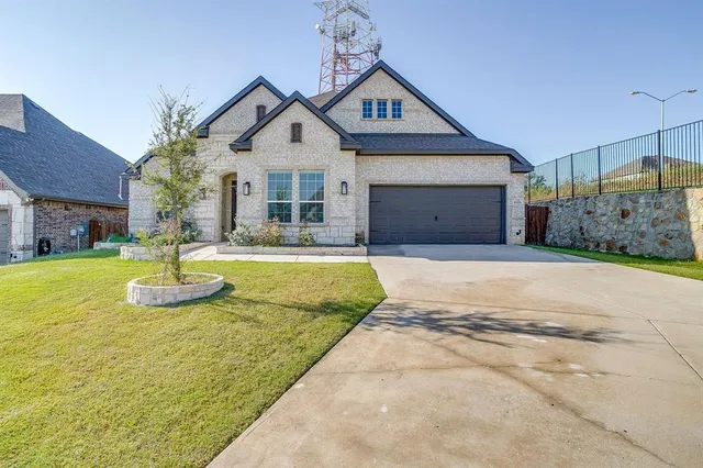 a front view of a house with swimming pool yard and outdoor seating
