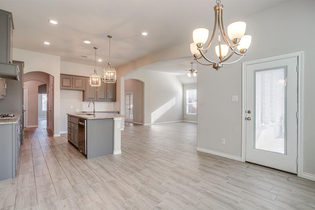 1281 Palo Duro Court Burleson, TX 76028 - Photo 39 of 39 a view of a kitchen and a chandelier