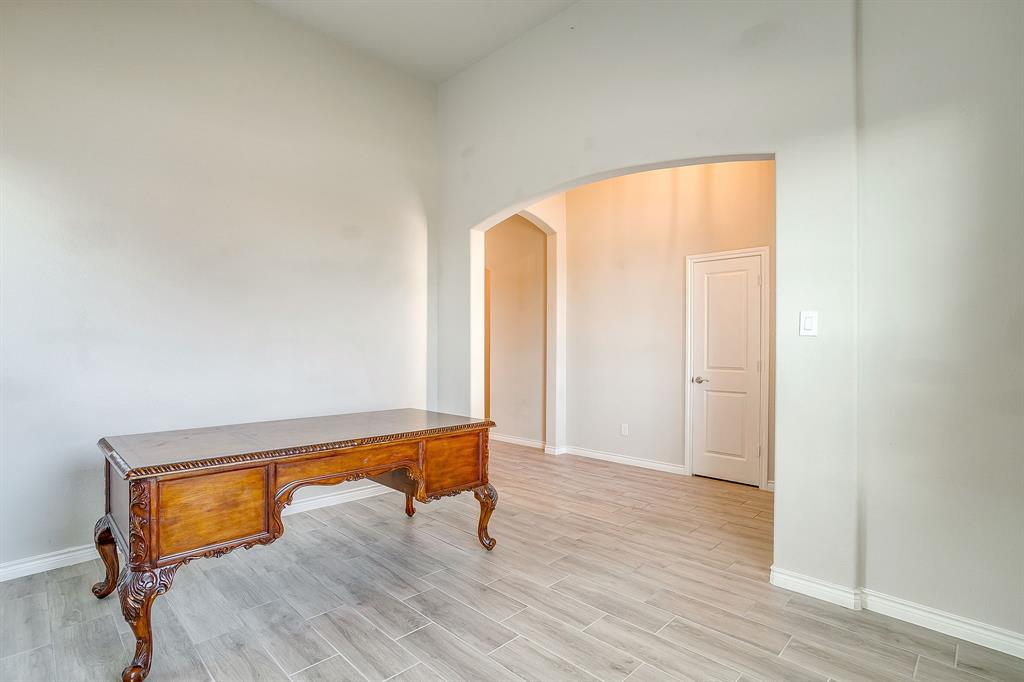1281 Palo Duro Court Burleson, TX 76028 - Photo 6 of 39 a room with a window and wooden floor