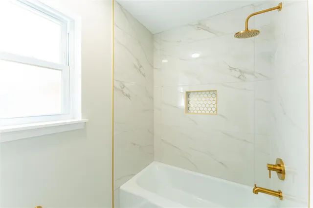 a bathroom with a bathtub