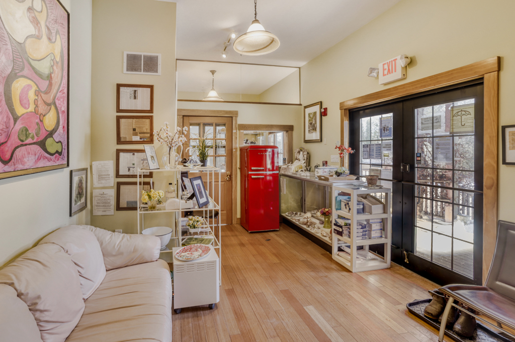 24 Cournoyer Road West Tisbury, MA 02568 - Photo 3 of 11 a living room with furniture gym equipment and a large window