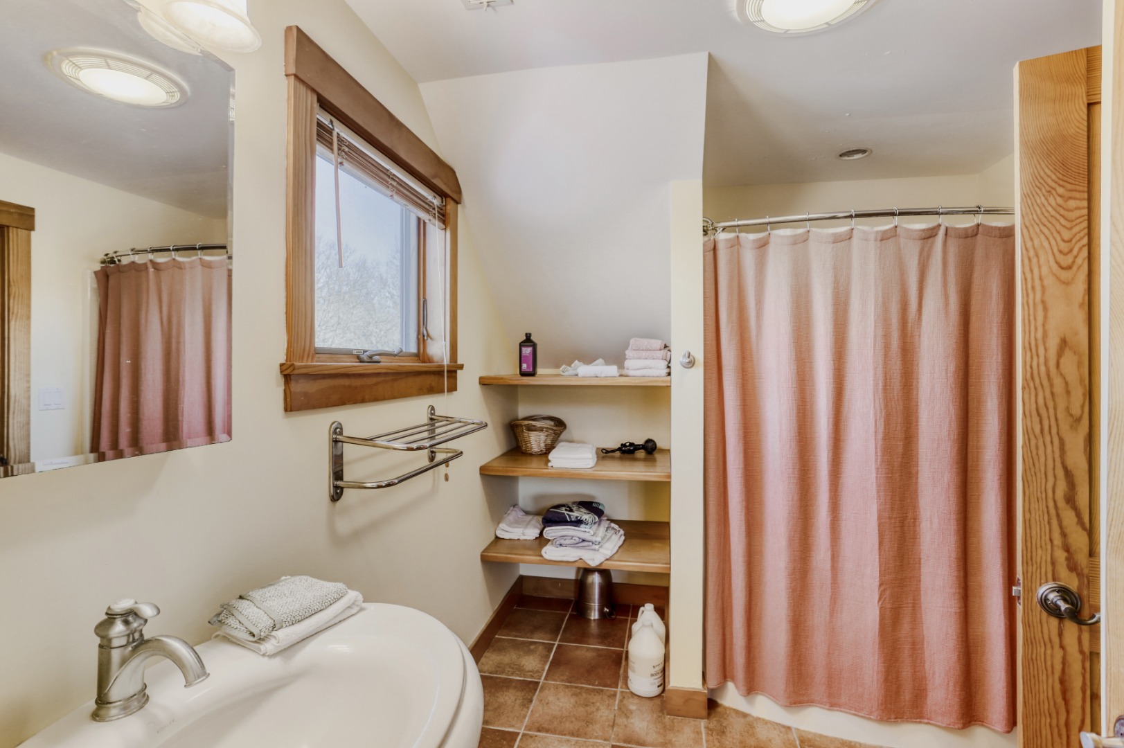 24 Cournoyer Road West Tisbury, MA 02568 - Photo 7 of 11 a bathroom with a sink a toilet and shower curtain