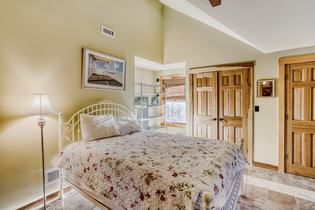 24 Cournoyer Road West Tisbury, MA 02568 - Photo 9 of 11 a bedroom with a large bed and a closet