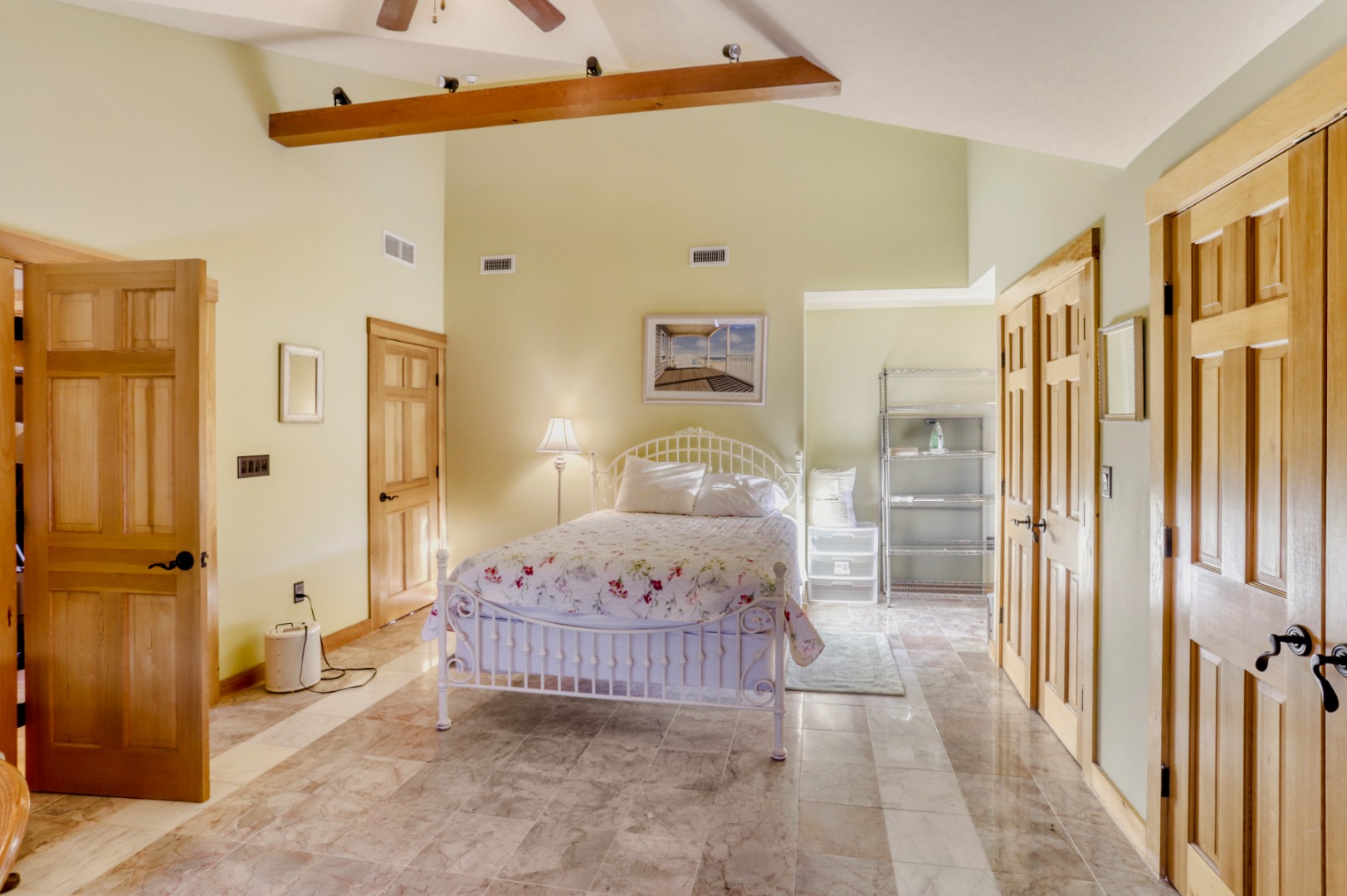 24 Cournoyer Road West Tisbury, MA 02568 - Photo 10 of 11 a spacious bedroom with a bed and a window