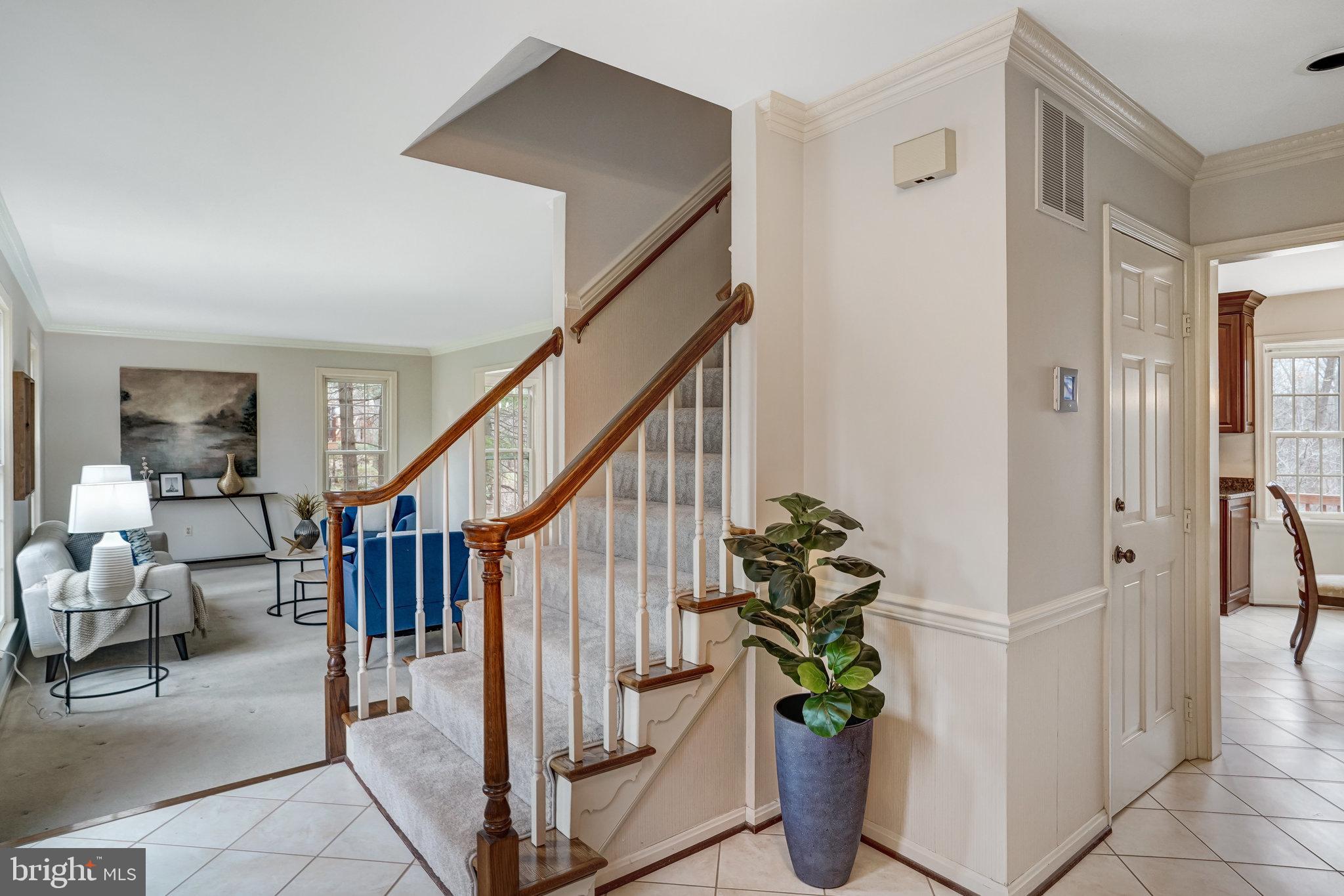 10708 Midsummer Drive Reston, VA 20191 - Photo 2 of 41 Welcoming foyer with handy coat closet