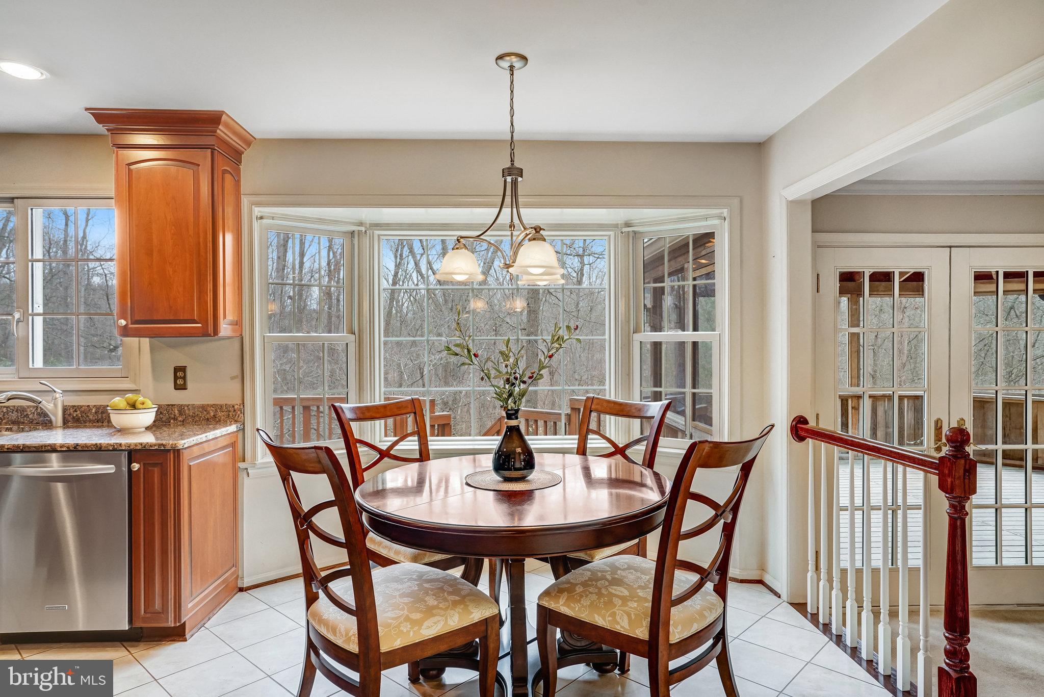 10708 Midsummer Drive Reston, VA 20191 - Photo 9 of 41 Enjoy backyard views from the kitchen too!