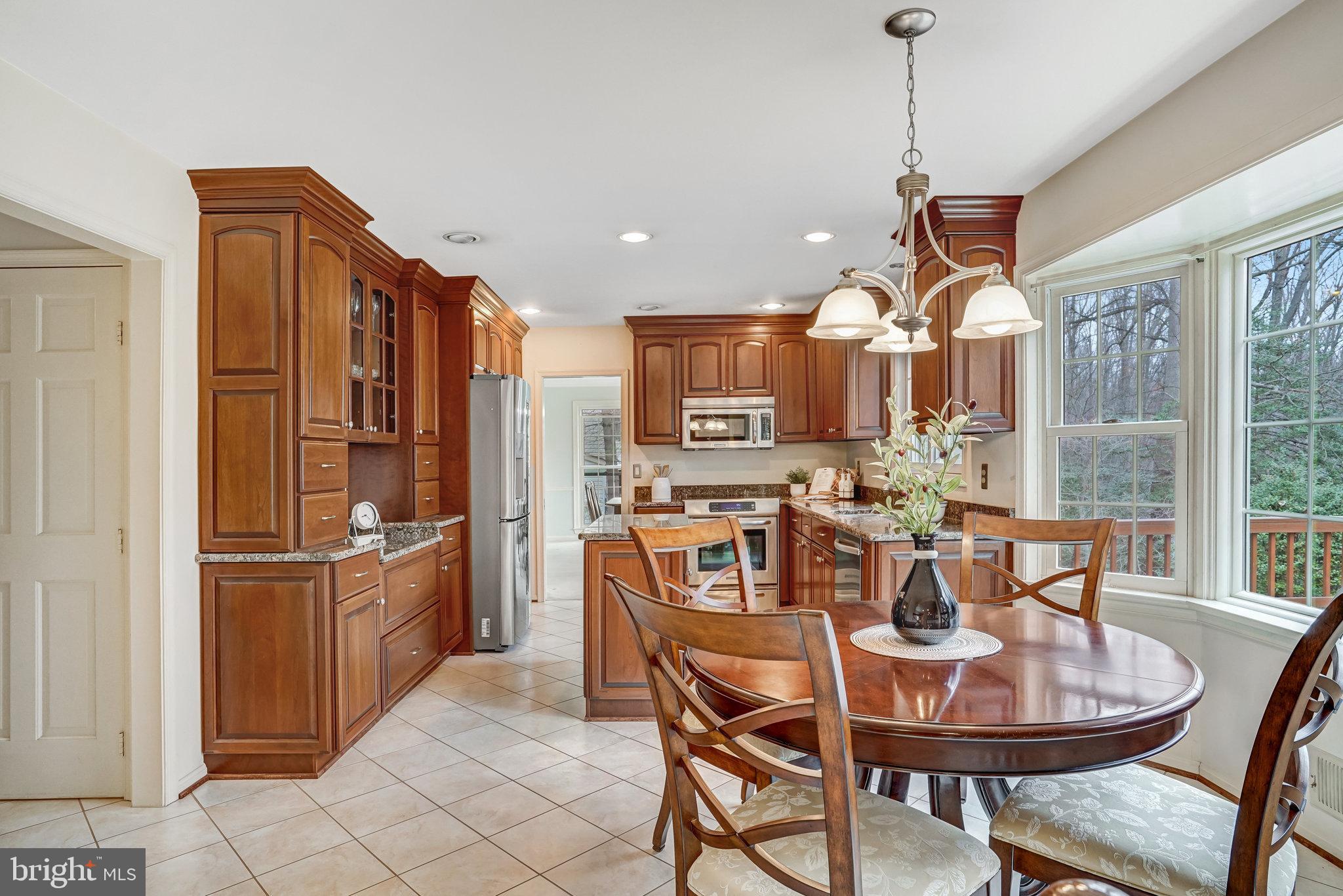 10708 Midsummer Drive Reston, VA 20191 - Photo 10 of 41 Kitchen opens to dining room and family room!