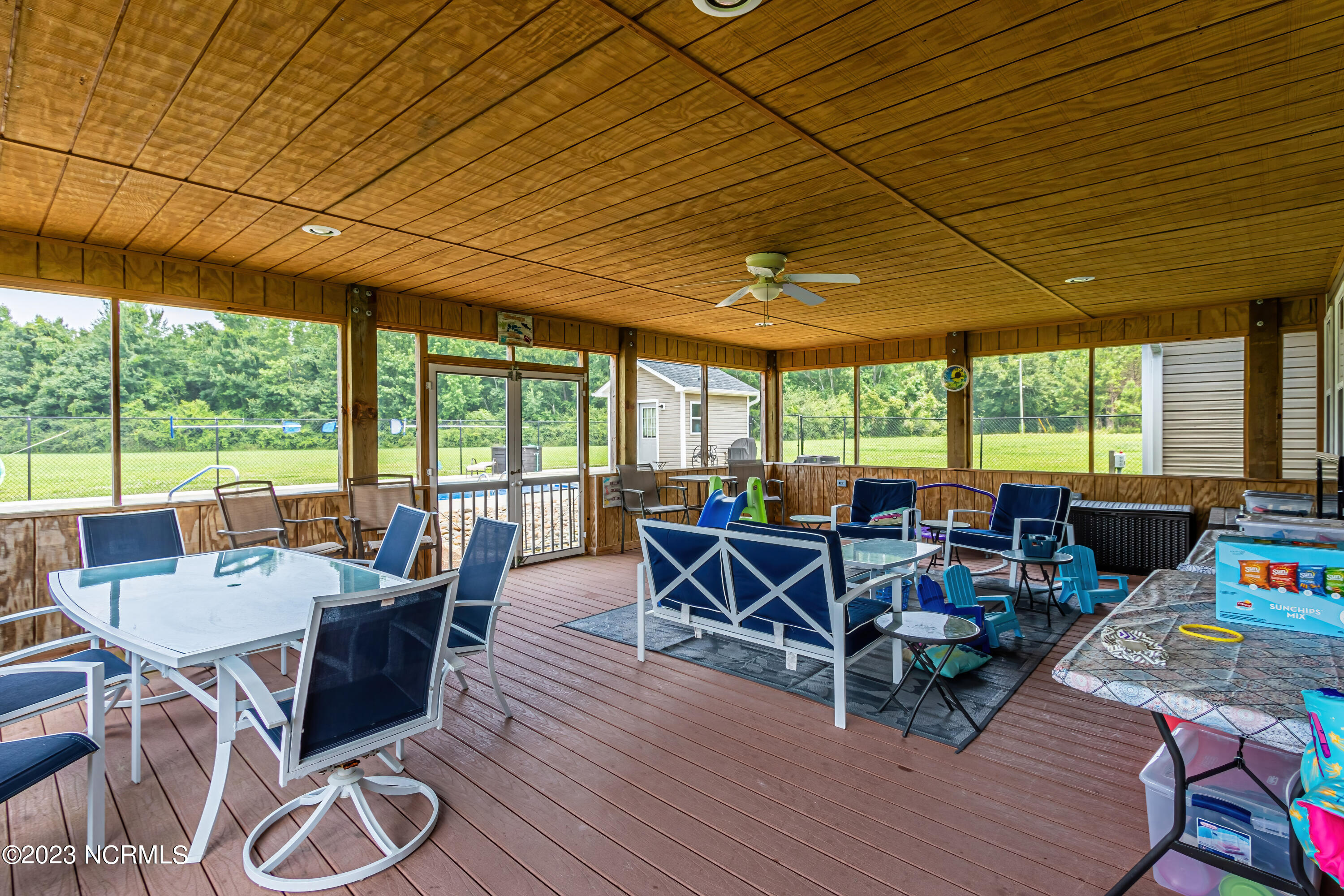 1428 Haws Run Road Maple Hill, NC 28454 - Photo 30 of 55 Screened in back porch