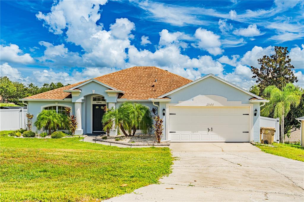 a front view of house with yard
