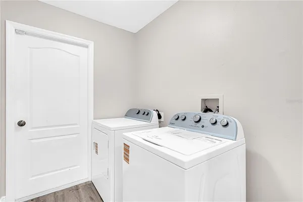 a utility room with dryer and washer