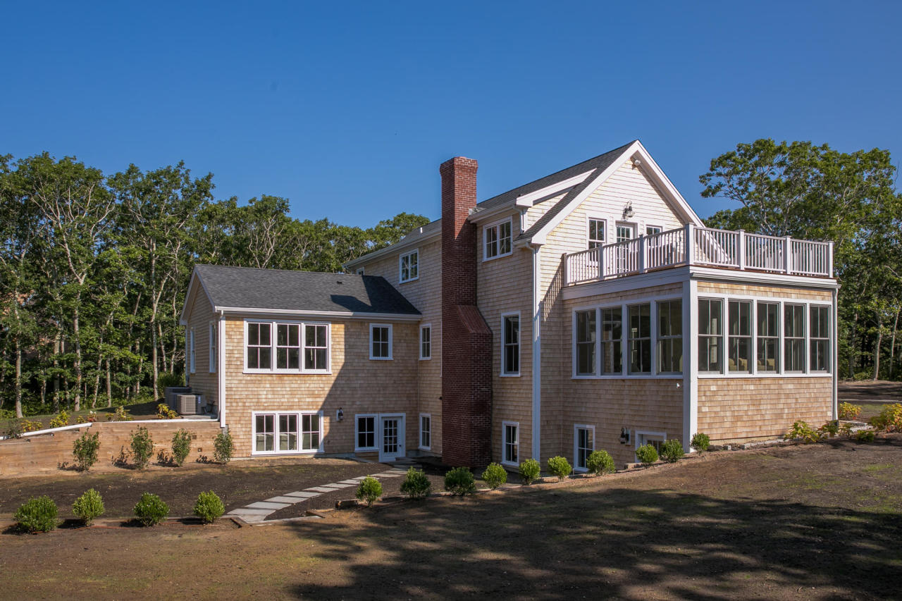28 Fishermans Knot Road Edgartown, MA 02539 - Photo 27 of 30 a view of large building with a street