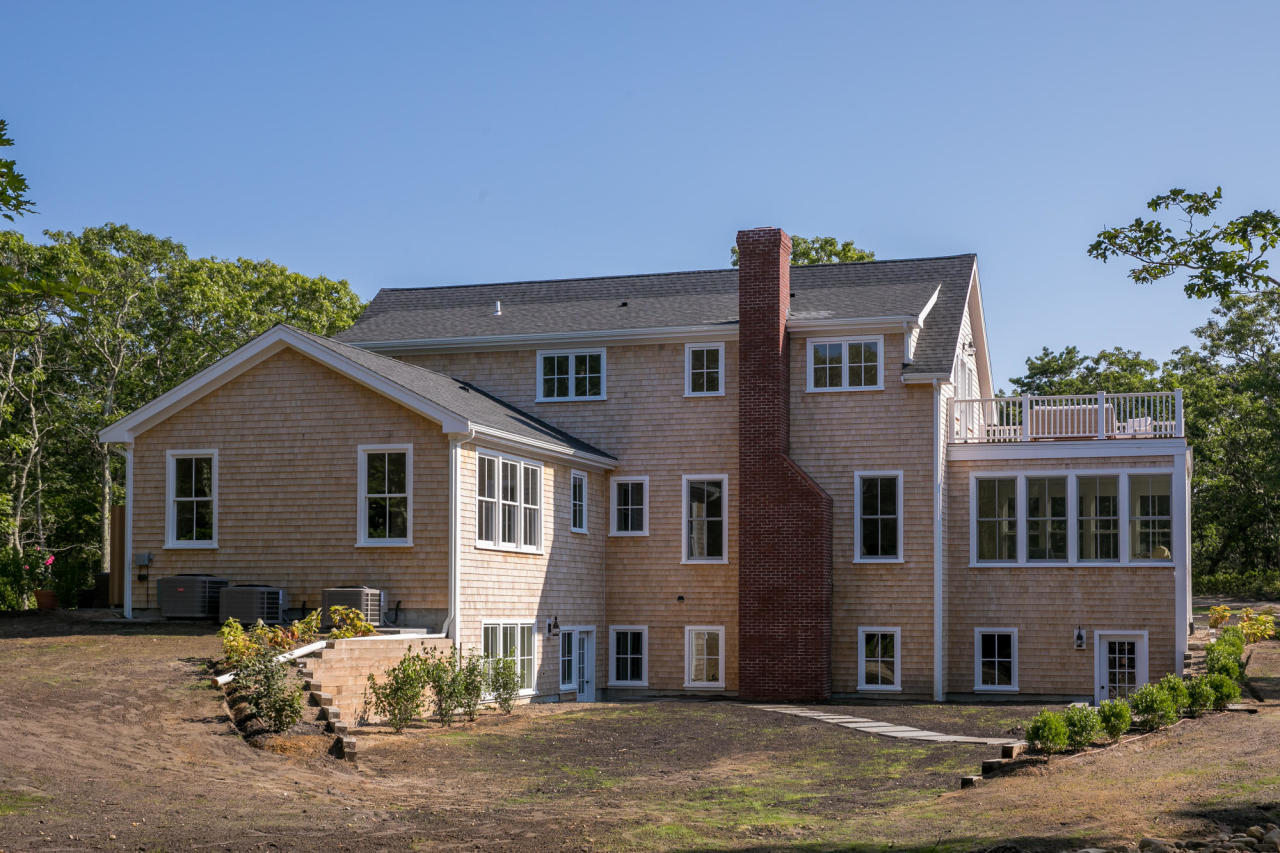 28 Fishermans Knot Road Edgartown, MA 02539 - Photo 30 of 30 a front view of a house with a yard