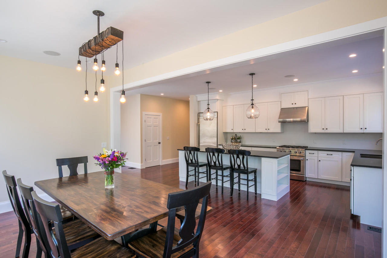 28 Fishermans Knot Road Edgartown, MA 02539 - Photo 8 of 30 a view of a dining room with furniture and wooden floor