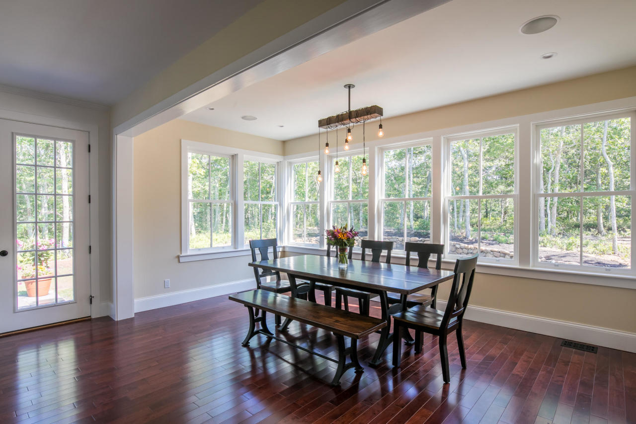 28 Fishermans Knot Road Edgartown, MA 02539 - Photo 10 of 30 a view of a dining room with furniture window and wooden floor