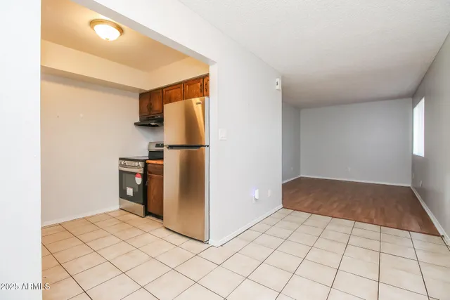 a view of a room that has a window in it