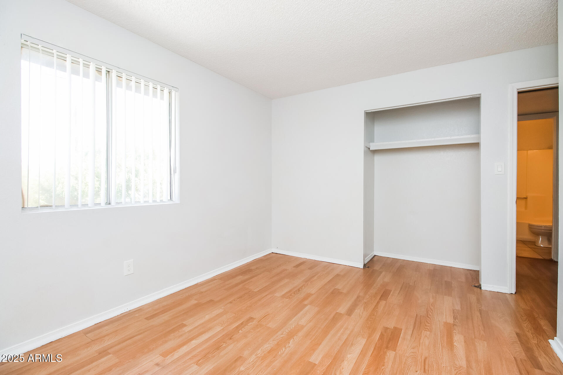 1050 West University Drive, Unit 201 Mesa, AZ 85201 - Photo 8 of 15 a view of a room that has a window in it