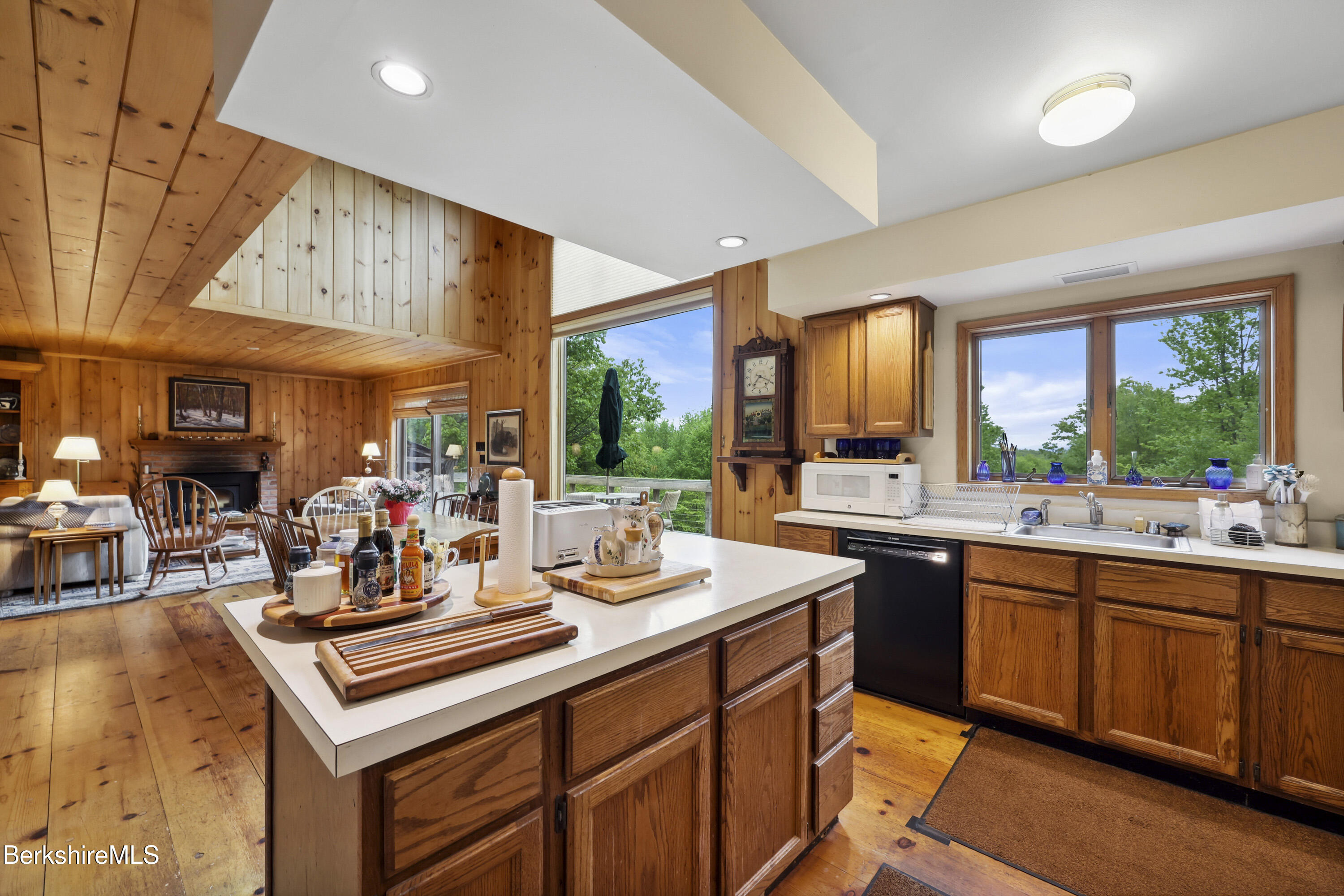 29 Old Village Road Alford, MA 01230 - Photo 21 of 72 a kitchen with a stove a sink dishwasher and a refrigerator with wooden floor