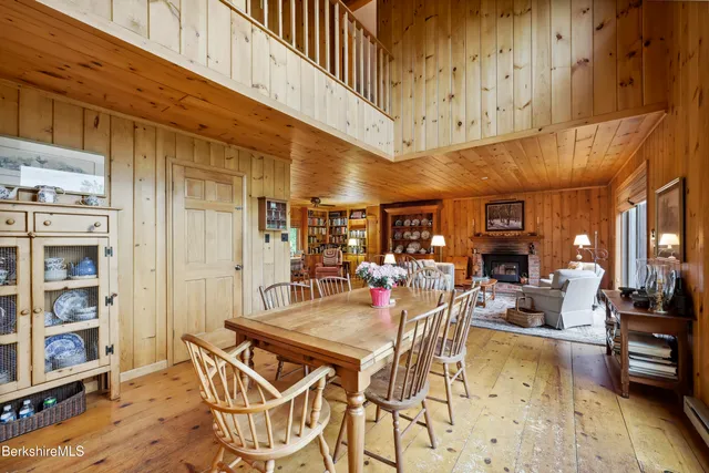 a bedroom with furniture and a gym equipment