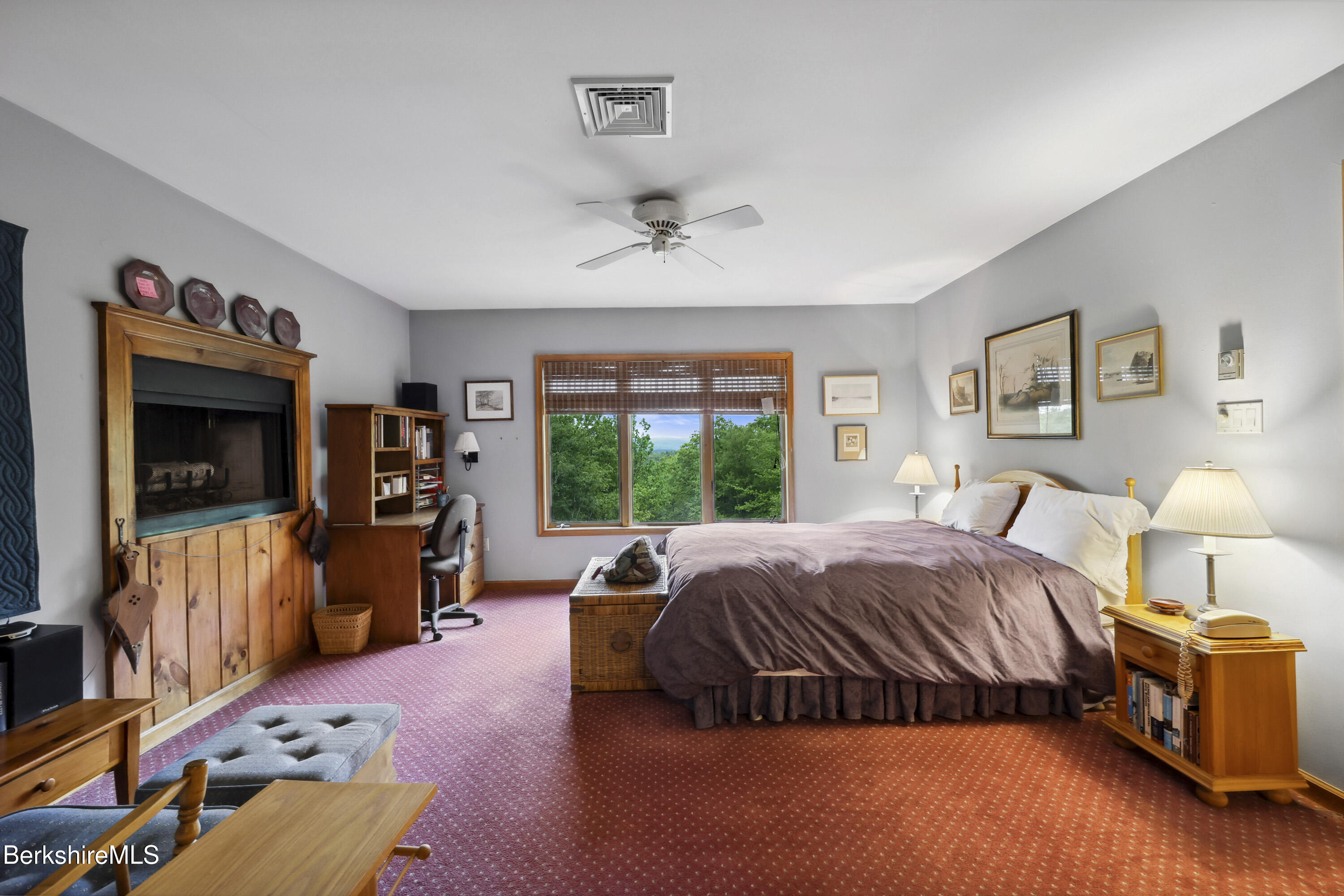 29 Old Village Road Alford, MA 01230 - Photo 25 of 72 a bedroom with a bed and a flat tv screen on the dresser