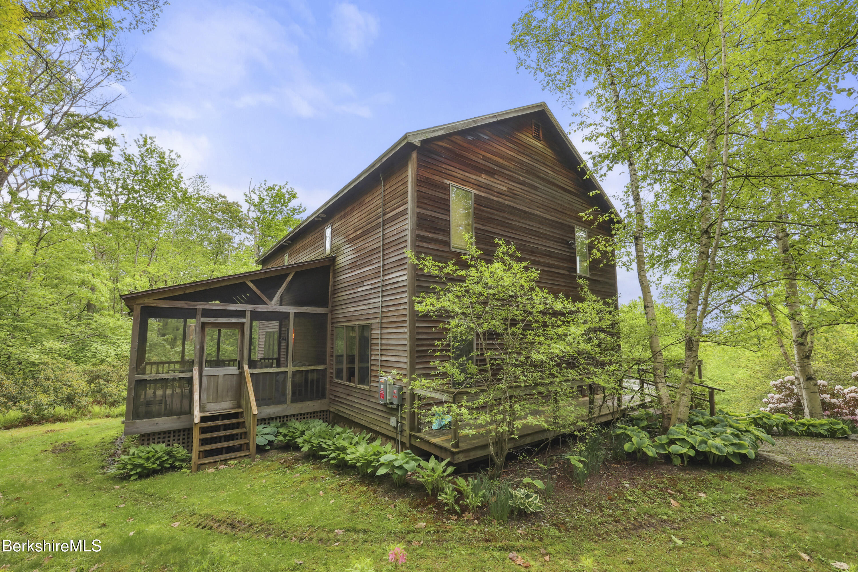 29 Old Village Road Alford, MA 01230 - Photo 3 of 72 a backyard of a house with lots of green space