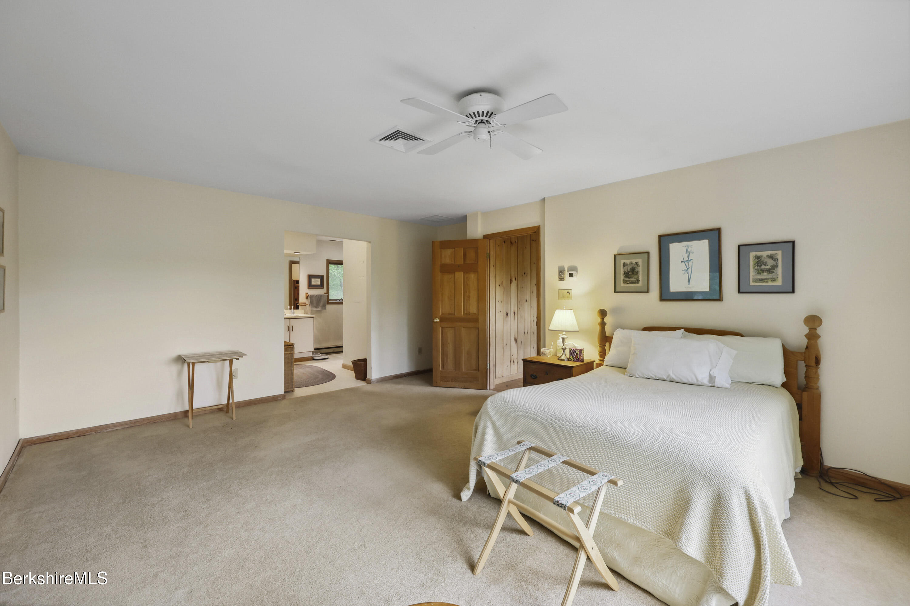 29 Old Village Road Alford, MA 01230 - Photo 42 of 72 a bedroom with a bed and a table in it