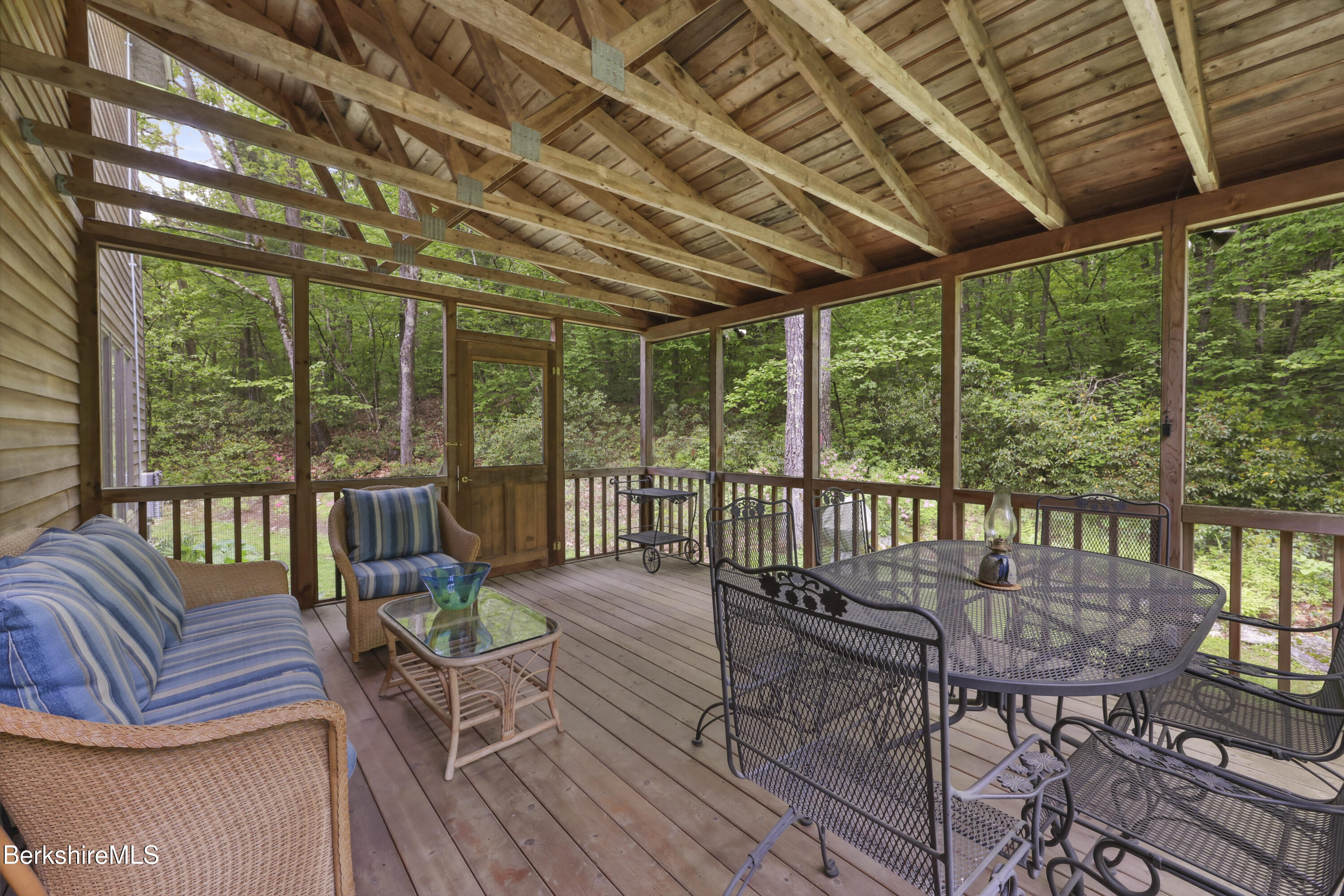 29 Old Village Road Alford, MA 01230 - Photo 47 of 72 a living room with furniture floor to ceiling windows and wooden floor