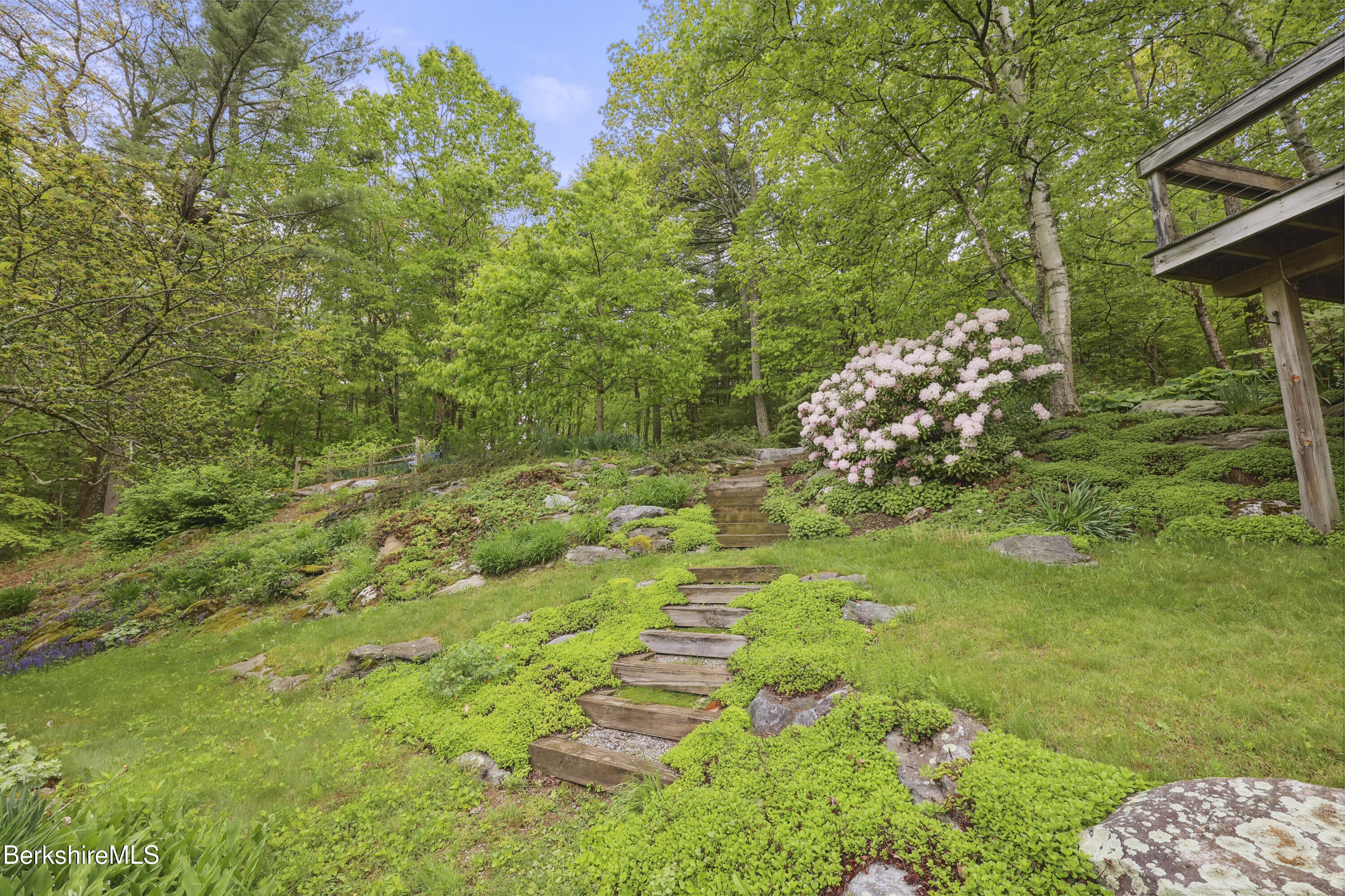 29 Old Village Road Alford, MA 01230 - Photo 52 of 72 a backyard of a house with lots of green space and garden