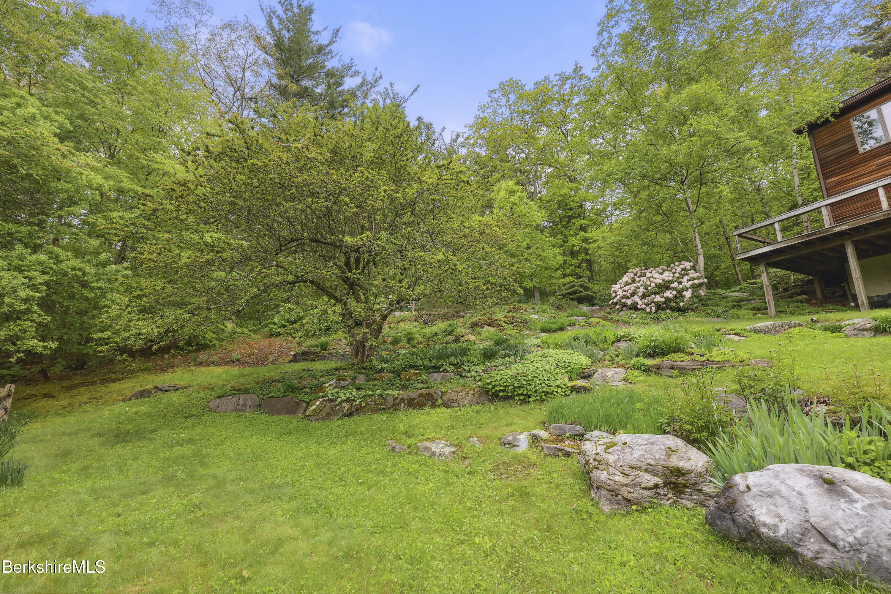 29 Old Village Road Alford, MA 01230 - Photo 54 of 72 a backyard of a house with lots of green space
