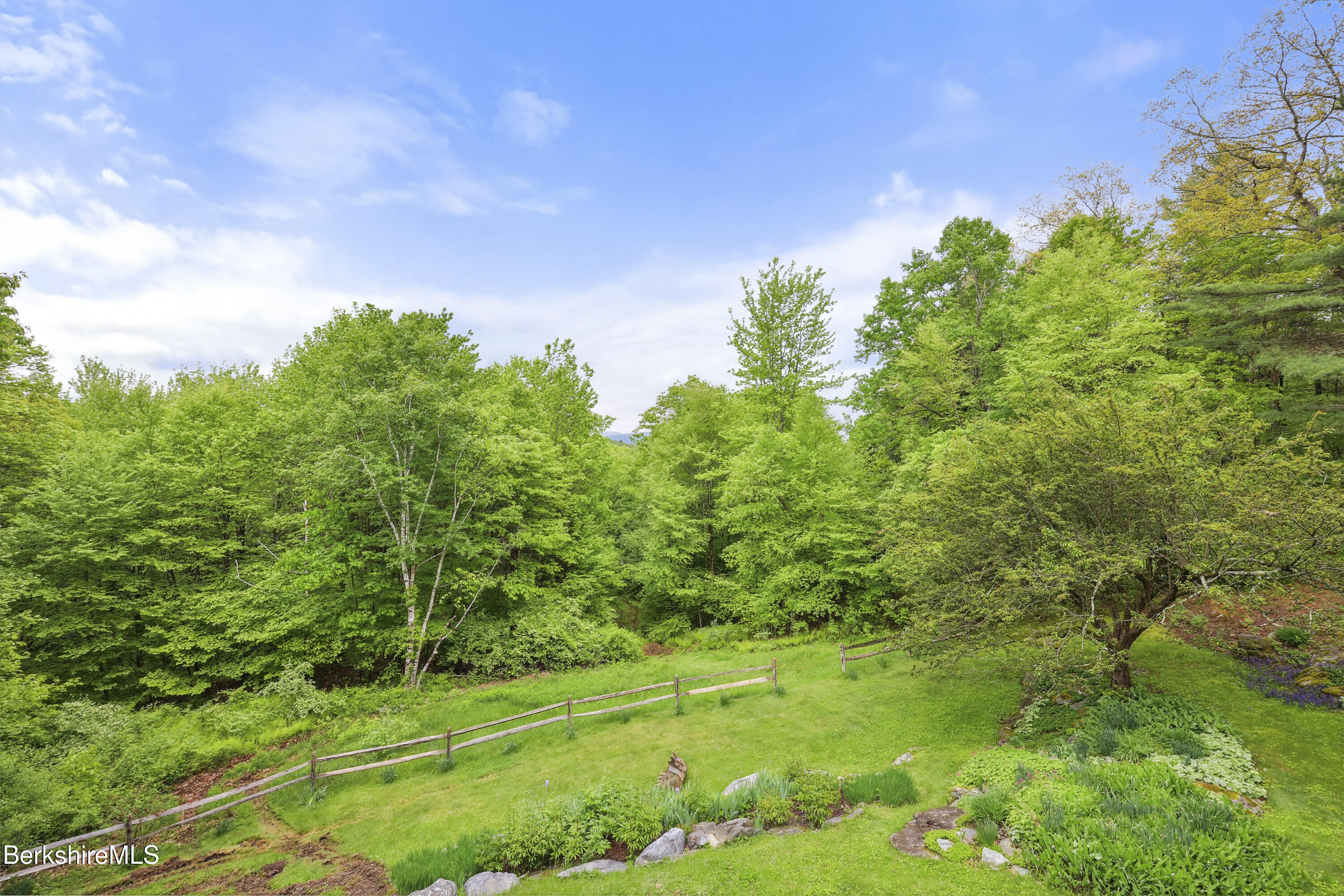 29 Old Village Road Alford, MA 01230 - Photo 58 of 72 a backyard of a house with lots of green space