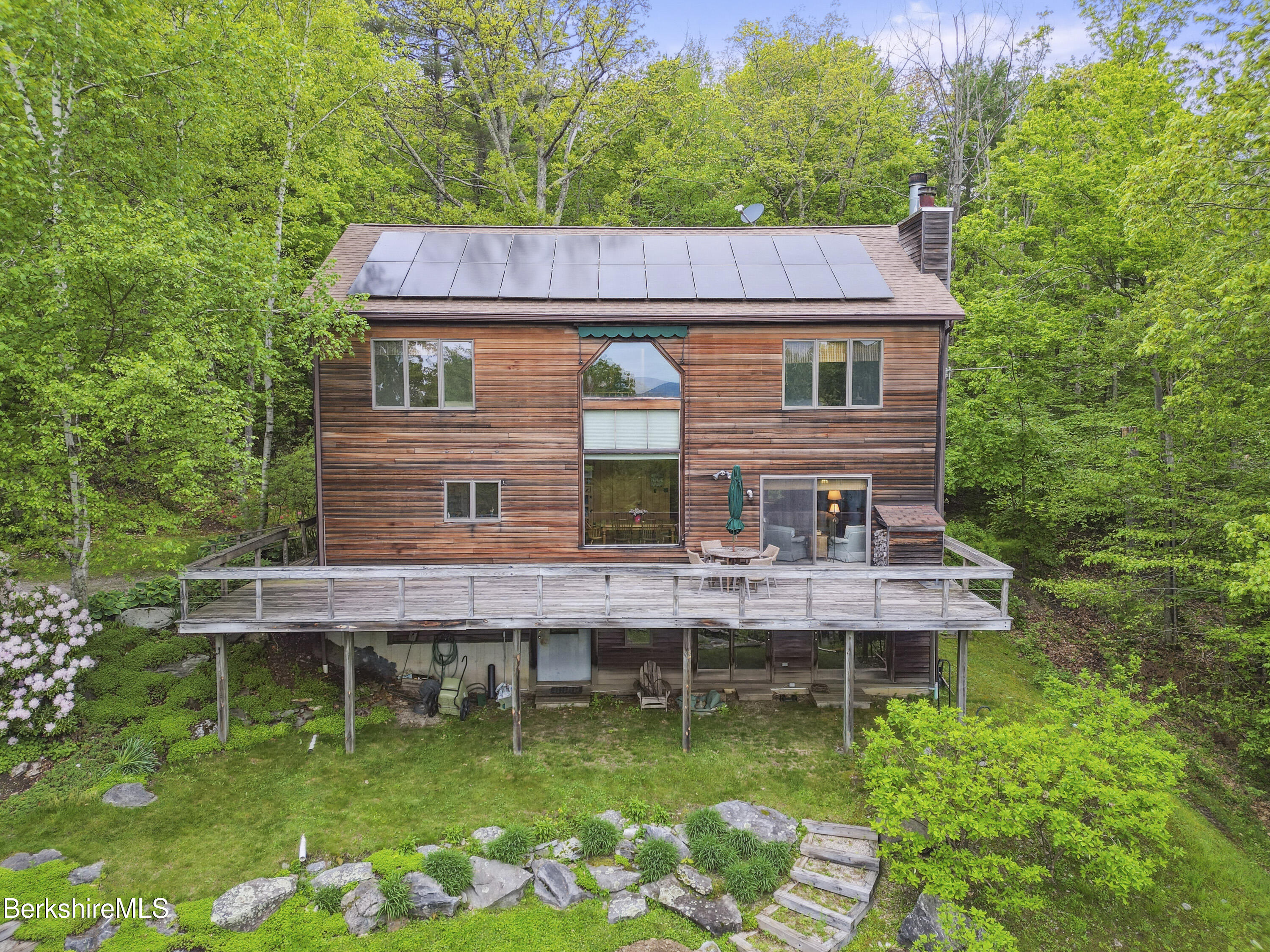 29 Old Village Road Alford, MA 01230 - Photo 72 of 72 a aerial view of a house with a swimming pool and sitting area