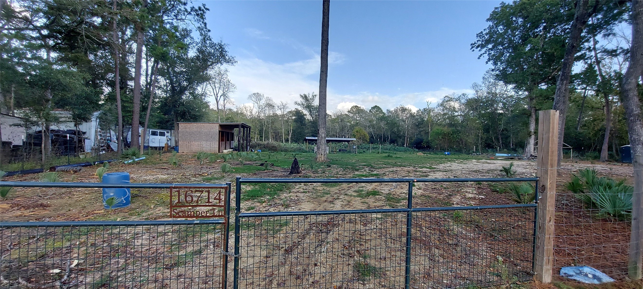 16714 Scamper Lane Crosby, TX 77532 - Photo 2 of 7 a view of a backyard
