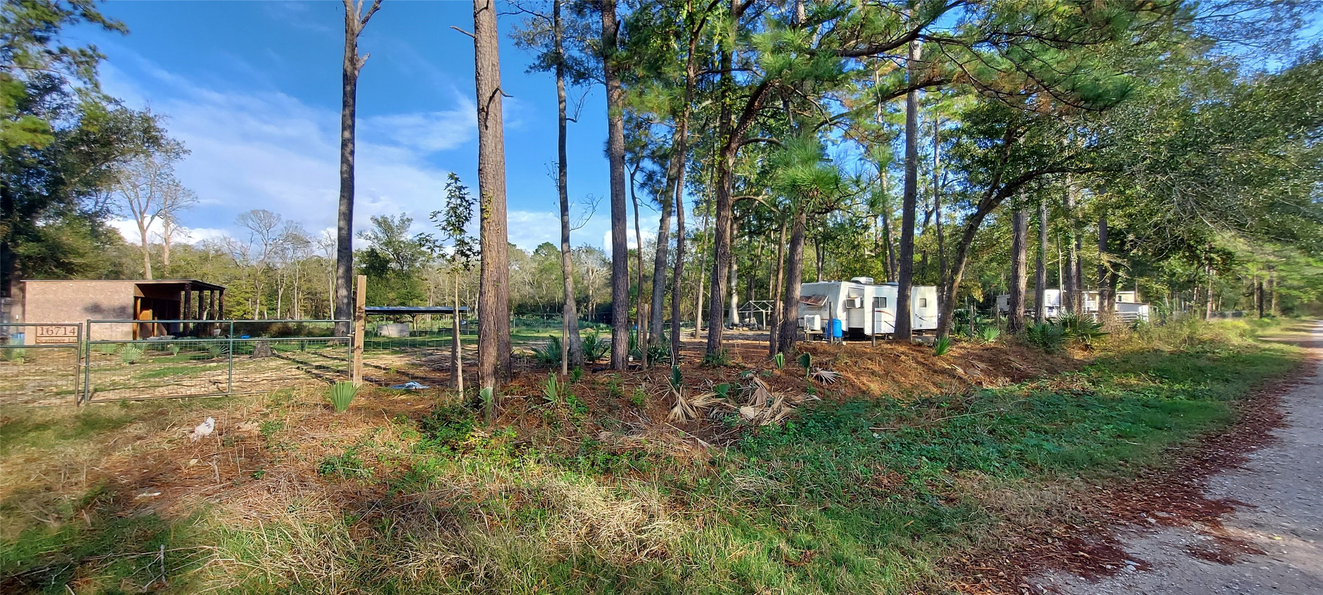 16714 Scamper Lane Crosby, TX 77532 - Photo 4 of 7 a view of a backyard with sitting area