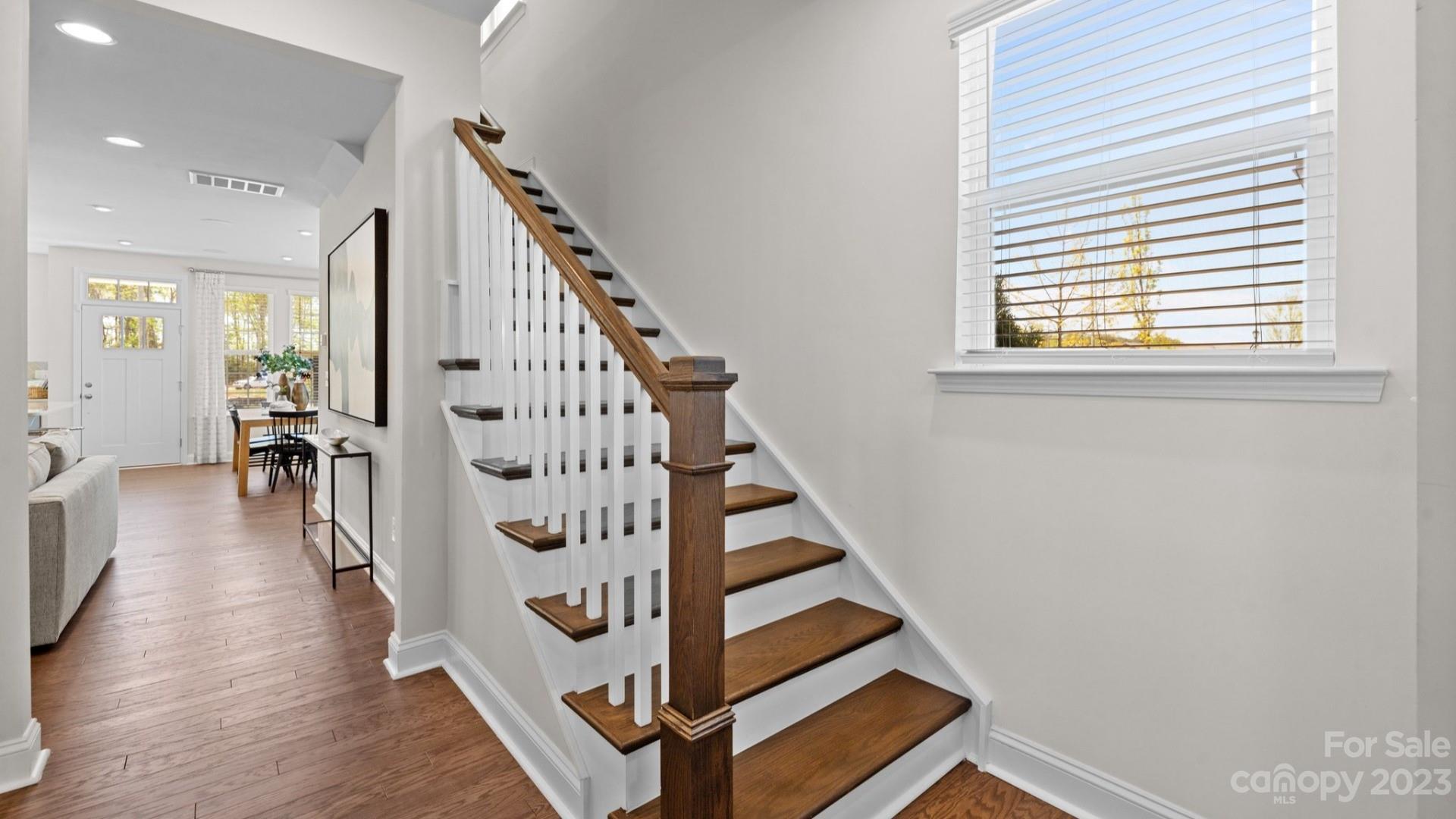 1063 South Point Road, Unit 25 Belmont, NC 28012 - Photo 5 of 11 a view of entryway with wooden floor and windows