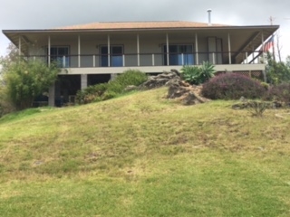 170 Naalae Road Kula, HI 96790 - Photo 21 of 23 a front view of a house having yard