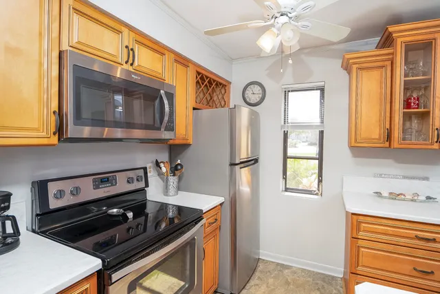 a kitchen with a stove and a microwave