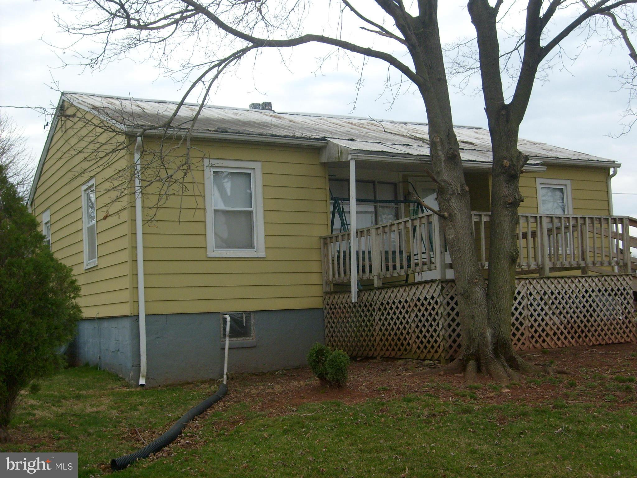 9006 Old Mill Road Rocky Ridge, MD 21778 - Photo 1 of 7 a view of a house with a yard