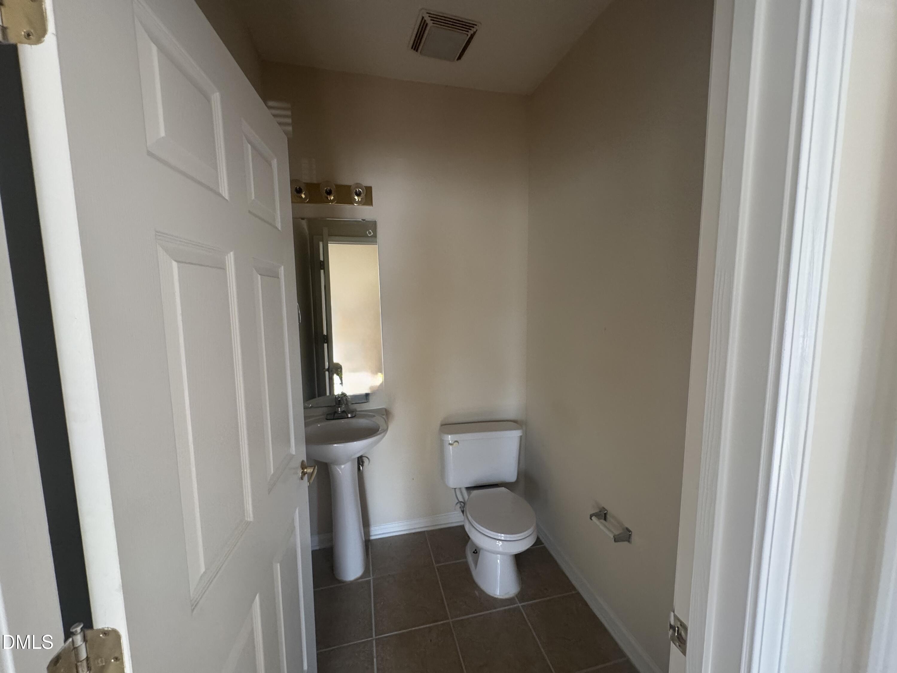 2510 Friedland Place, Unit 202 Raleigh, NC 27617 - Photo 17 of 25 a bathroom with a toilet