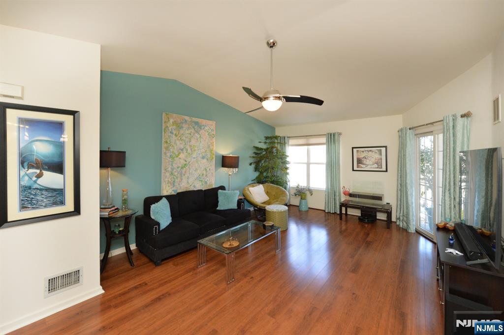 20 Parkside Court Wayne, NJ 07470 - Photo 3 of 22 a living room with furniture window and wooden floor
