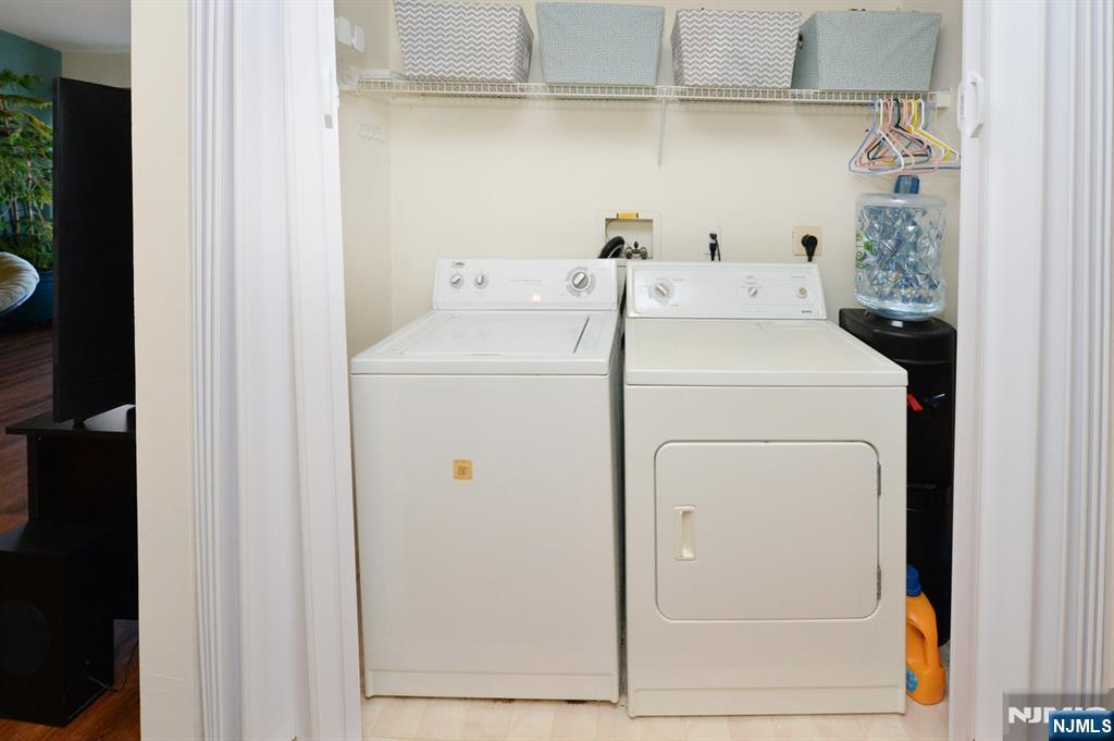 20 Parkside Court Wayne, NJ 07470 - Photo 9 of 22 a utility room with dryer and washer