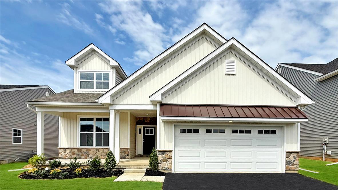 328 Abby Road, Unit LOT 15 Macungie, PA 18062 - Photo 1 of 26 A welcoming facade with cream siding and stone accents creates inviting curb appeal.