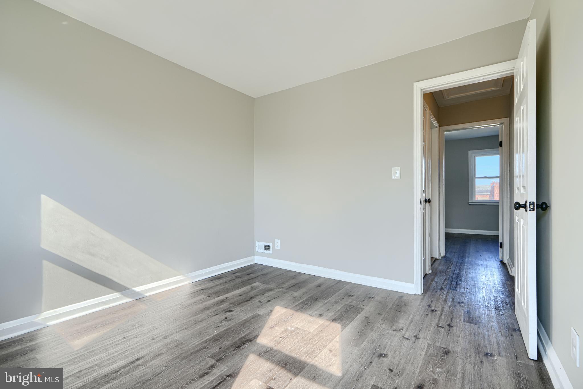 435 Joplin Street Baltimore, MD 21224 - Photo 14 of 30 Bright and airy room with modern finishes.